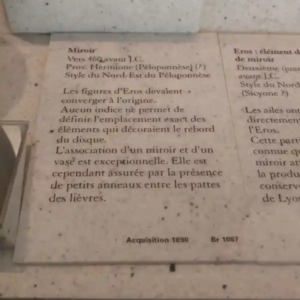 Circular mirror with two angels